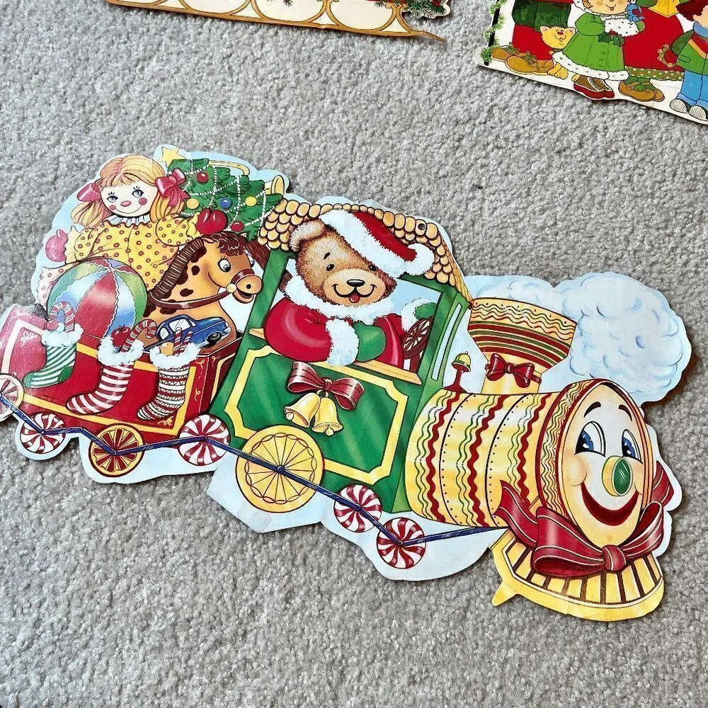 Set of 4 Holiday Christmas Diecuts by Eureka U.S.A. Candy cane Santa/Sleigh Caro